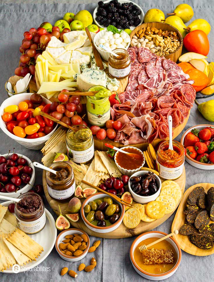 Charcuterie board recipe ideas for an amazing grazing table with cured meats, cheeses and spreads.