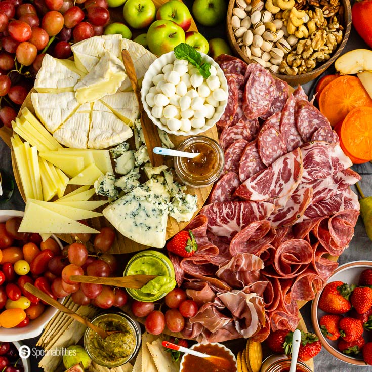 charcuterie board and cheese board recipe ideas with gourmet spreads and food.