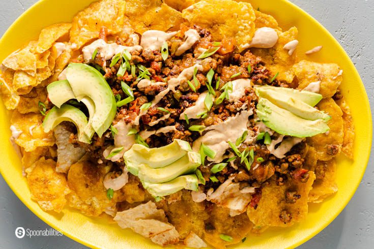 Overhead photo with a tied close-up of the nachos. Recipe at Spoonabilities.com