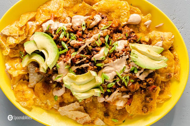 Overhead photo with a tied close-up of the nachos. 