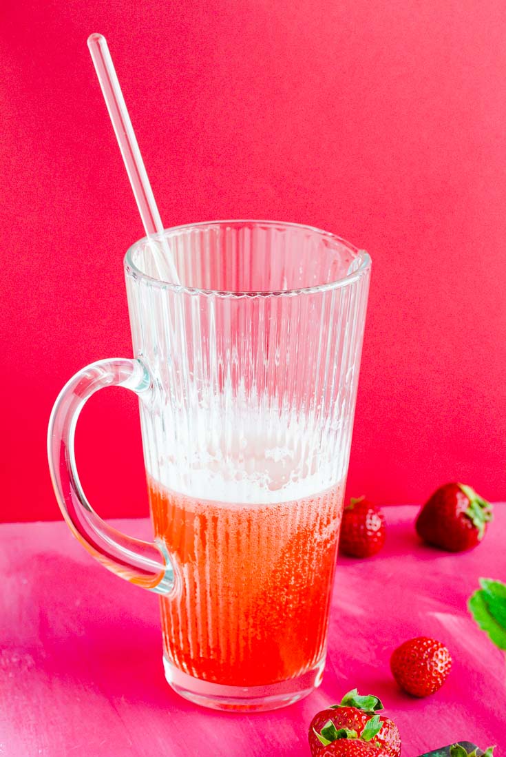 Large big batch pitcher of strawberry mint iced tea