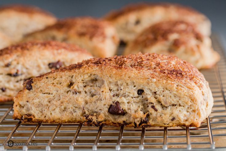 A close up photo of the scone showing the filling with chocolate chips and nuts. Recipe at Spoonabilities.com