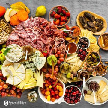 A charcuterie board is more than assorted cheese and cured meat. It’s a statement; a blank canvas for creative ideas, an opportunity to showcase beautiful food, and your ability to put it together harmoniously. Learn a few tricks and tips to master the art of assembling snacks, cheese, and other one-biters in an impressive charcuterie board. #charcuterie #cheeseboard #curedmeats #charcuterieboard #wineandcheese #grazingtable