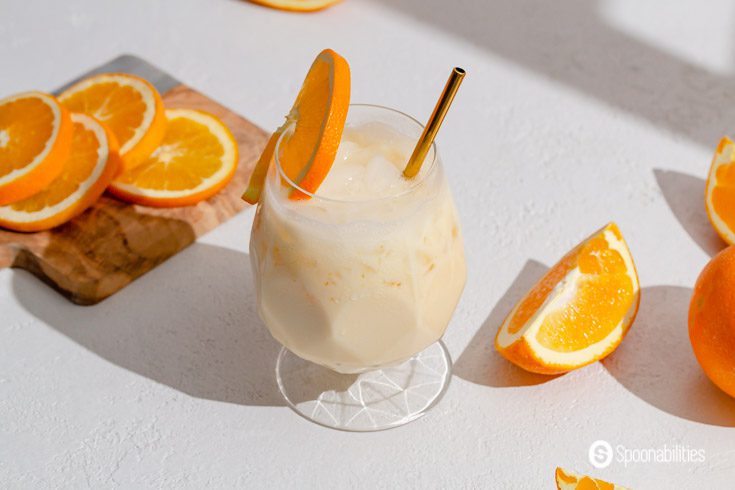 Close up of the glass with the Milk and Orange Juice Drink/morir sonando.