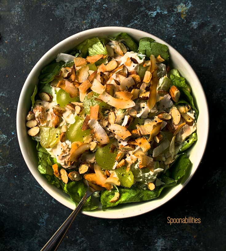 Close up overhead photo of Chicken Salad with Grapes on a bed of lettuce 