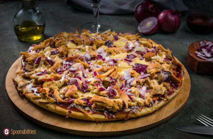 closeup of a full BBQ Chicken Pizza pie