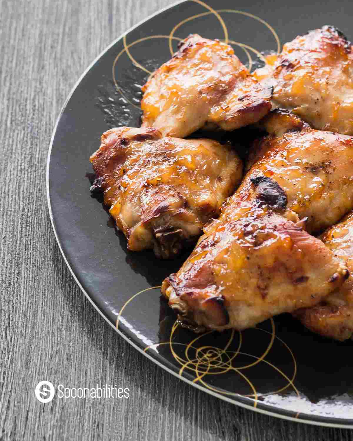 Close up of oven roasted chickens on a plate