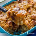 A slice of pumpkin bread pudding with caramel drizzle