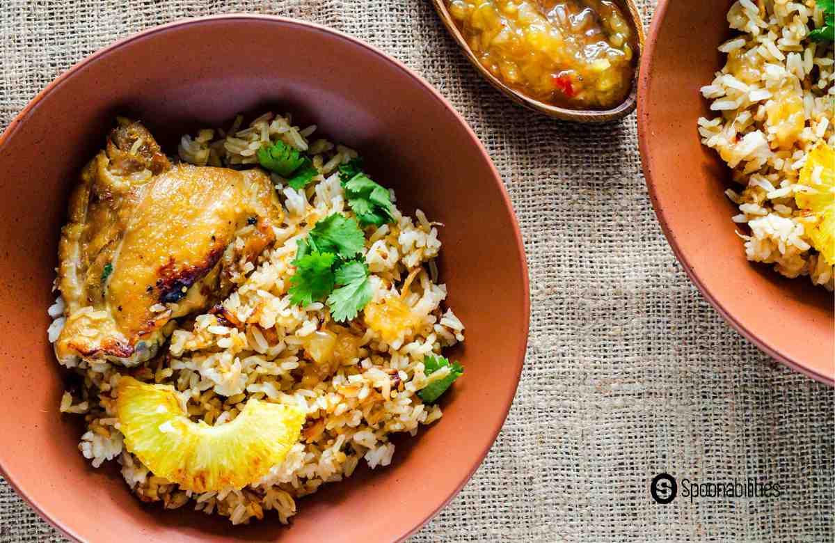 Chicken and rice casserole plates with roasted pineapple habanero sauce