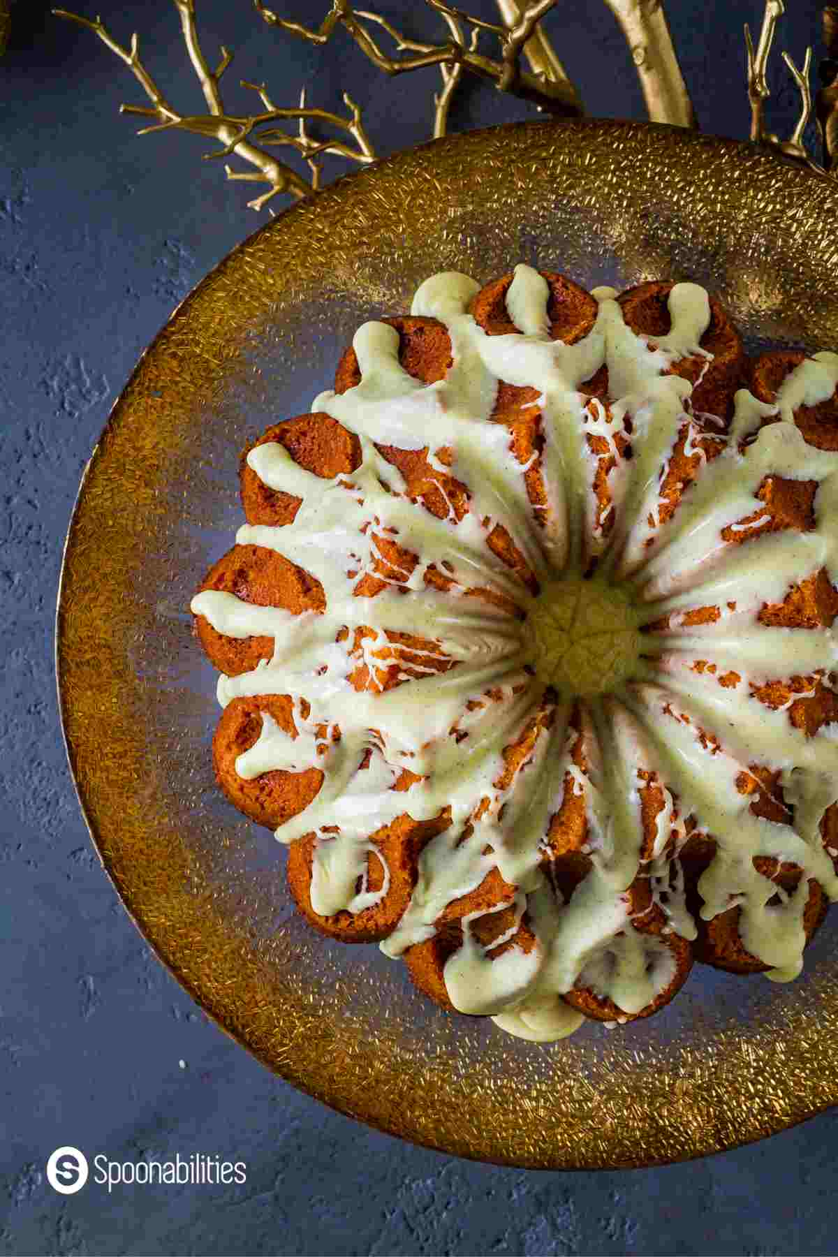 top view of eggnog brandy cake with flowing drizzle