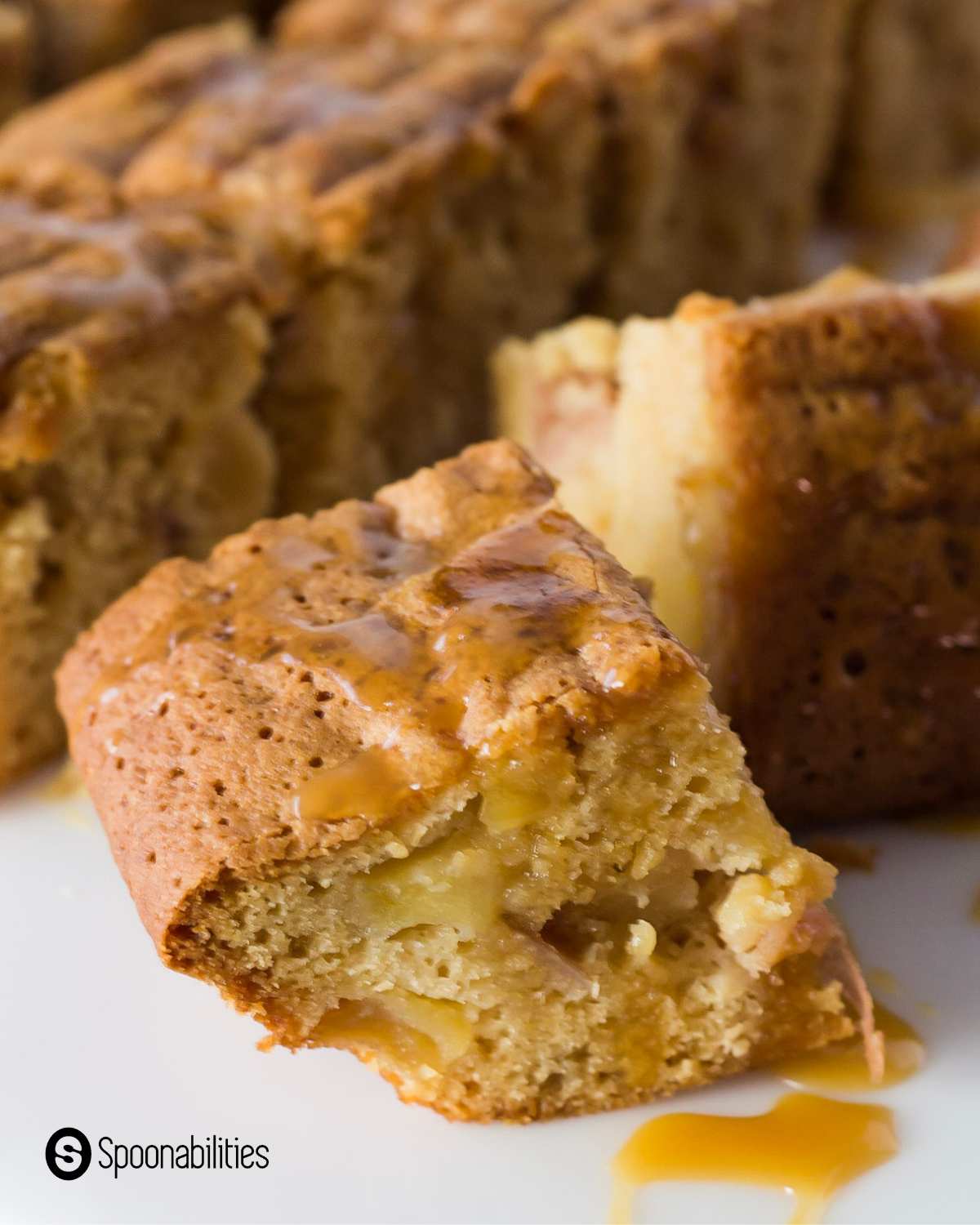 close up of blondie brownie drizzled with caramel sauce