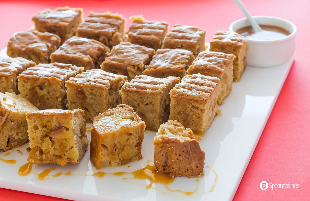 Salted caramel apple blondie brownies with caramel sauce on the side