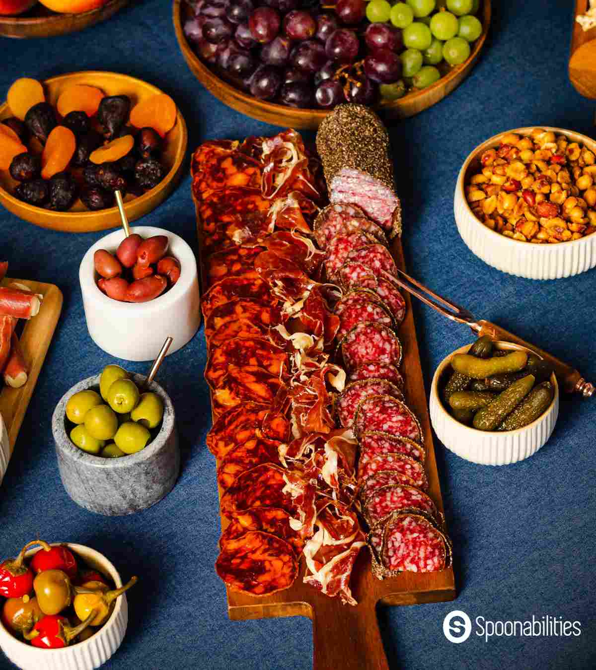 Charcuterie board with meats and produce