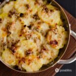 Leek & potato gratin baked with cheese on top