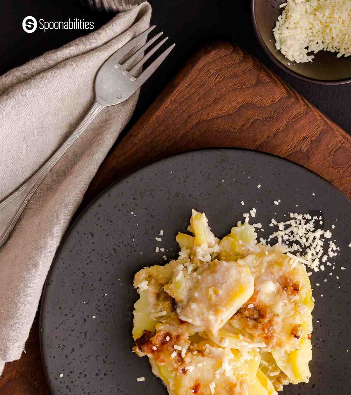 A plate of potato leeks gratin with more cheese toppings