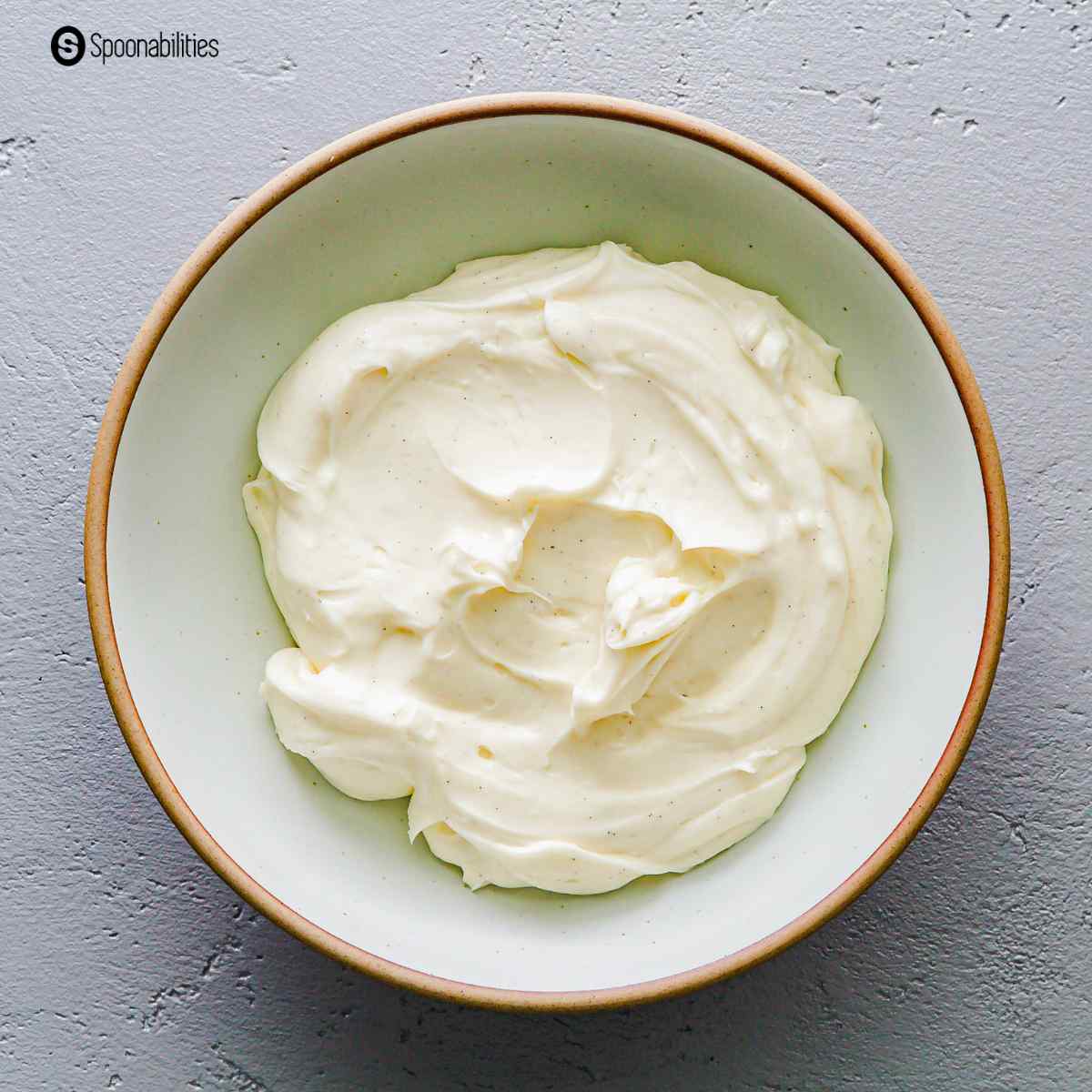 Cream cheese filling in a large mixing bowl