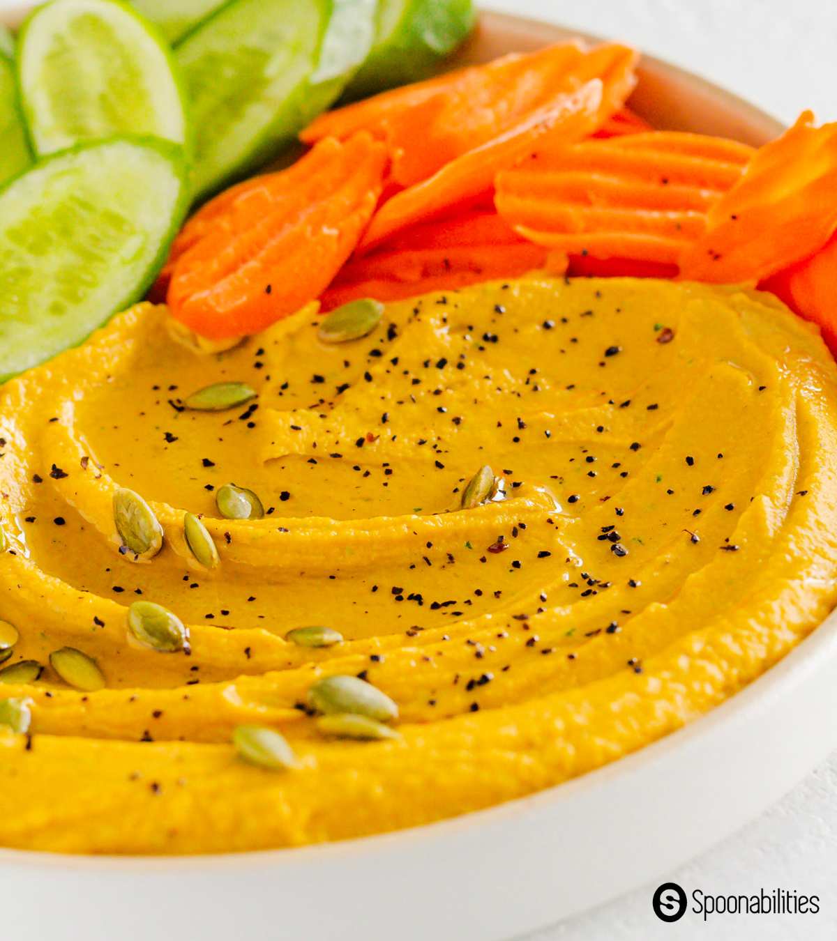 close up shot of pumpkin hummus dip