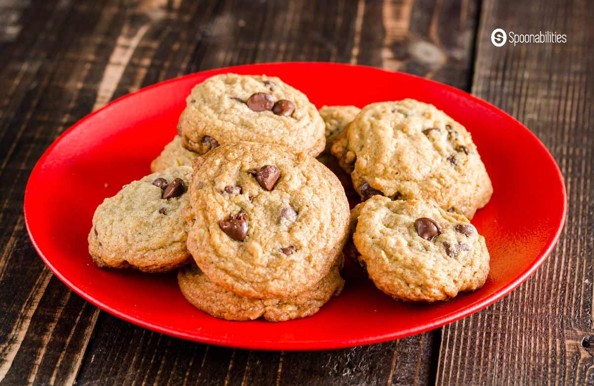 Choco chip cookies on a red plate